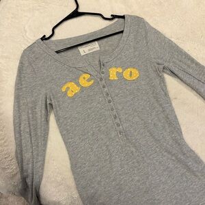 Gray Long Sleeve Henley with Yellow Lettering